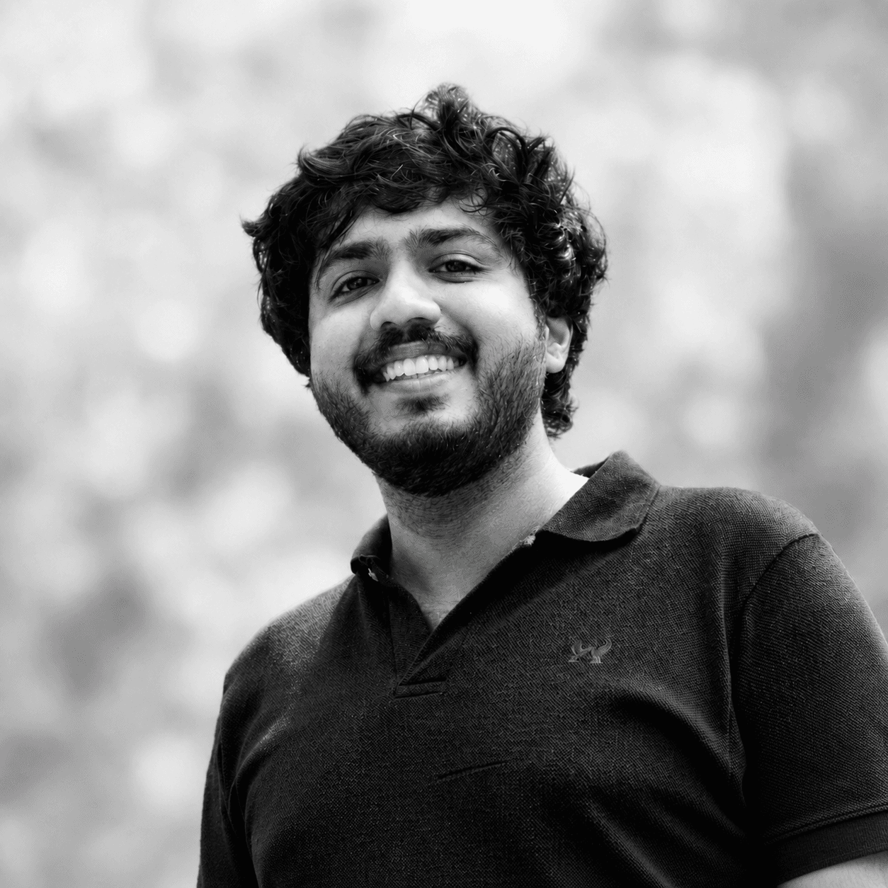 Black-and-white portrait of Anuvind Asok